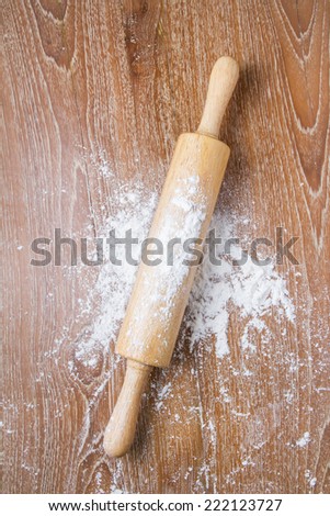 rolling pin on table with flour