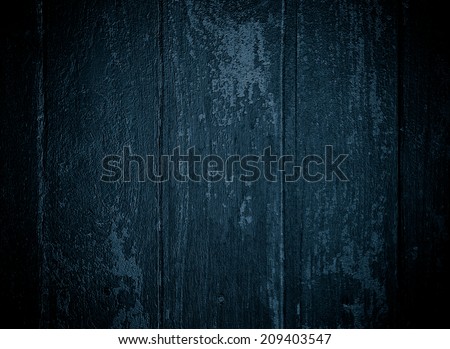 painted old wooden wall.dark blue background