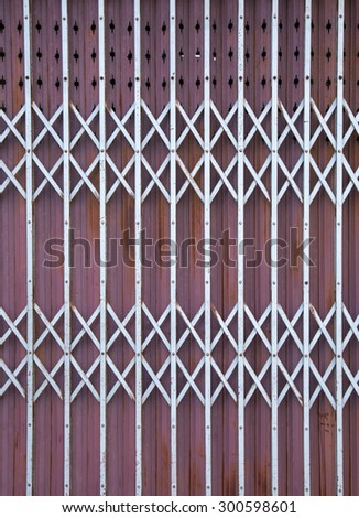 Antique slide steel locked shutter door, texture background