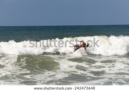 SAN DIEGO USA - SEPTEMBER 1st, 2014: People in San Diego surfing. San Diego is very well known for surfing