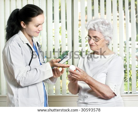 Young female doctor with senior patient