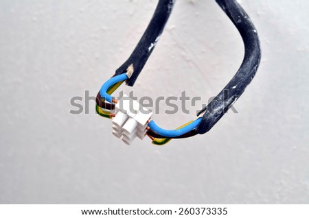 Closeup detail of electrical cable from the socket boxes connected by terminal