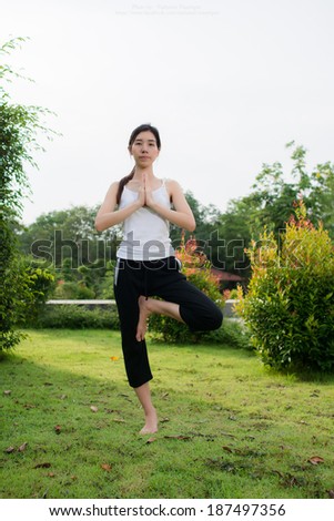 women yoga in the garden