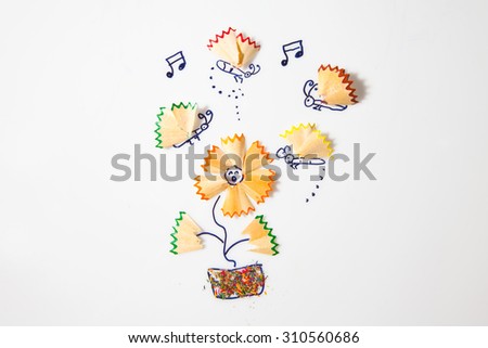 ?Butterflies and flower make from pencil shavings isolated on white background