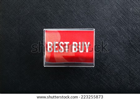 Acrylic stand with the word best buy represent as a sign display for customer to know the new products