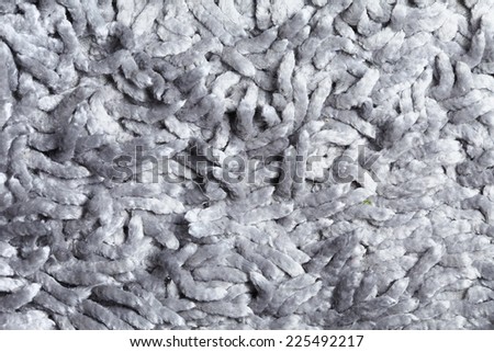 Dirty cloth decoration carpet grey color in the scene represent the roughly surface fabric texture.