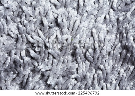 Dirty cloth decoration carpet grey color in the scene represent the roughly surface fabric texture.