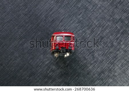 Vintage and classic miniature plastic model railcar represent the model railway and model making related idea concept.