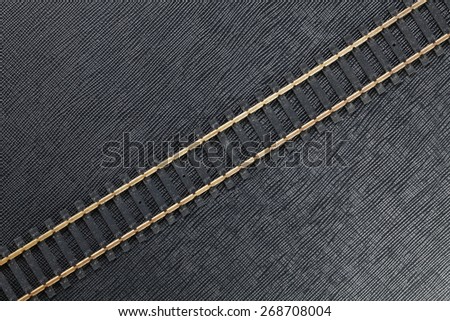 Vintage and classic miniature plastic model railway track represent the model railway and model making related idea concept.