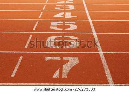 The running race track number screen on ground surface represent the sport concept related idea.