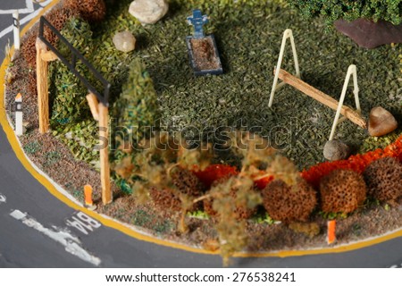 Vintage and classic style miniature model railway layout in the scene appear the park scenic represent the model railway and model making related idea concept.