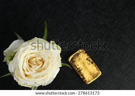 White rose and gold represent the flower and business concept related idea.