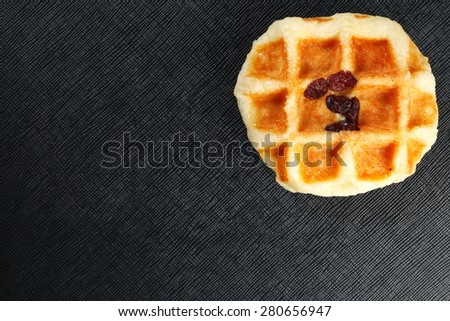 Rum raisin waffle represent the bakery dessert and food concept related idea.