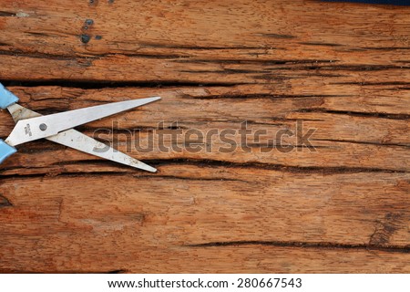 Old and classic style of wood roadbed surface texture with scissors represent the abstract concept related idea.