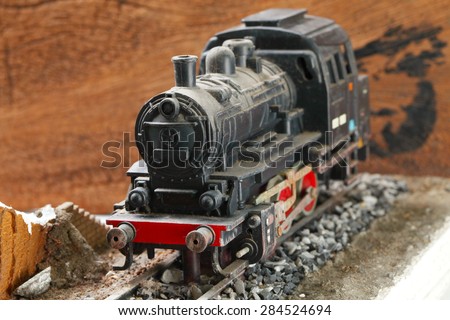 Vintage and classic miniature model railway scene appear the German locomotive represent the model railway concept related idea. Super macro shot and intention focus at the locomotive.