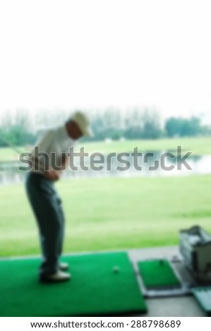 Blurry focus scene of golf course master swing action represent the golf sport course concept related idea.