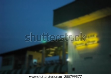 The blurry focus of golf driving range lighting signage scene tone represent the golf sport course concept related idea.