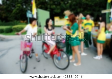 Blurry focus scene of people activity among daytime natural light represent the people activity concept related idea.