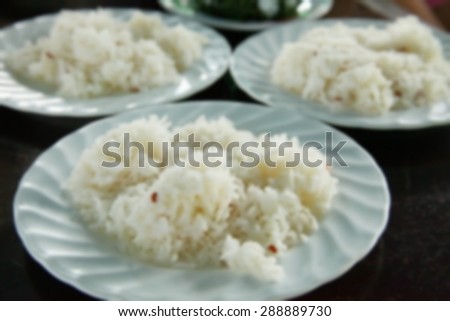 Blurry focus of rice on the food table scene represent the food background concept related idea.
