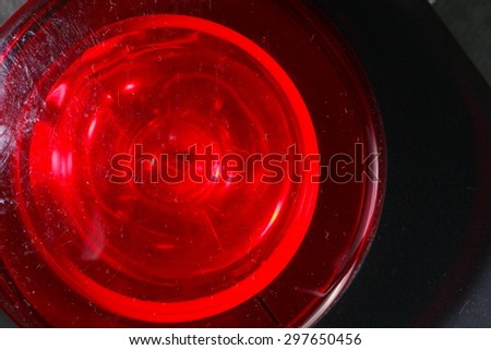 Red light plastic lens cover for emergency light represent the emergency light and car tool background concept related idea.