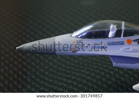 Diecast model jet plane cockpit part focus represent the diecast model toy plane concept related idea.