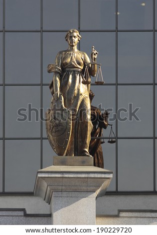 Russia. Moscow. Statue of the Goddess of Justice in front of the Supreme Court of Russia. March 16, 2012