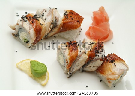 Traditional the Japanese meal sushi on a white background