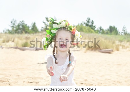 Adorable little baby girl wearing flower head band