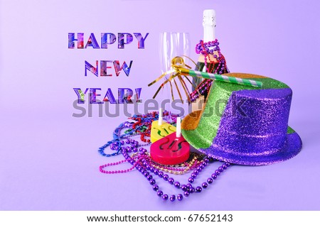 Happy New Year card party invitation New Years Eve 2012 still life with champagne bottle and flutes, noisemakers, party hat, and beads on purple background