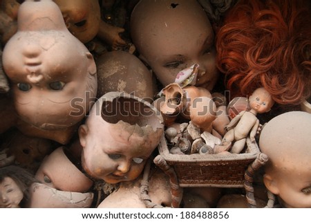 Scary doll\'s heads (with some white dust spots)