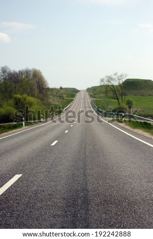 Country road in Europe at summer time