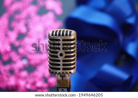 The concept of media presentations. Retro microphone on background. Concert and show poster. Music album cover.