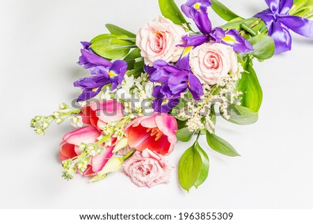 A beautiful bouquet of fresh flowers isolated on white background. The festive concept for Weddings, Birthdays, March 8th, Mother\'s, or Valentine\'s Day. Greeting card, flat lay, mockup, template