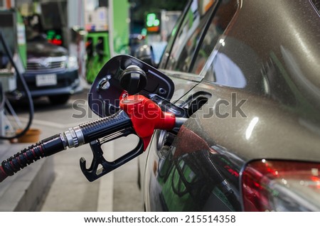 refilling the car with fuel on a filling station