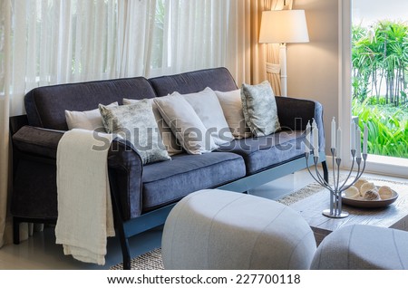 luxury living room with blue sofa