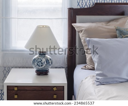 chinese lamp style on table side in luxury bedroom