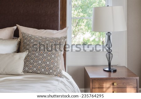 luxury white lamp on wooden table in bedroom
