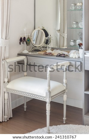 classic white chair with dressing table at home