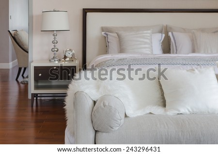 luxury grey sofa on carpet in luxury bedroom at home