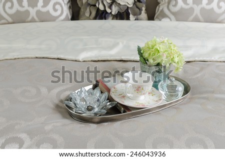 tray of tea cup and plant in luxury bedroom at home