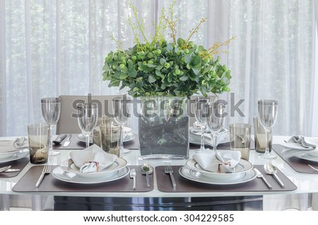 plants in glass vase on dinning table in dinning room