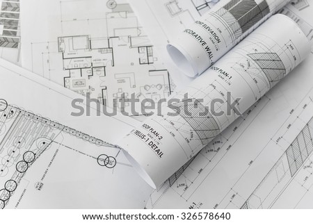 architectural for construction drawings  with roll of blueprint