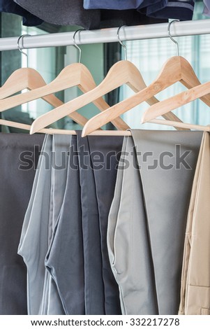 plants hanging on coat hanger in wardrobe