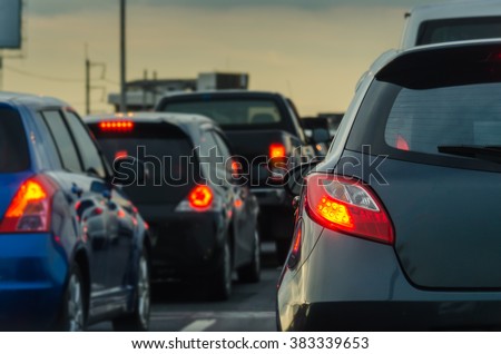traffic jam with row of cars on expressway during rush hour