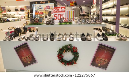 KUALA LUMPUR - DEC 19 : Shoe Stores in Jaya Jusco Wangsa Maju, Kuala Lumpur made sales during the festive Christmas day in Kuala Lumpur, Malaysia on Dec 19, 2012.