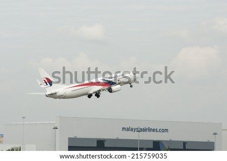 SEPANG, MALAYSIA - AUGT 4: Boeing 737-8H6(WL) registered with number 9M-MLU owned by Malaysia Airlines (MAS) take off at Kuala Lumpur International Air Port, Sepang, Malaysia on August 4, 2014.