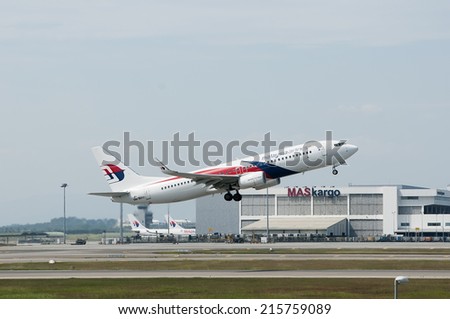 SEPANG, MALAYSIA - AUGT 4: Boeing 737-8H6(WL) registered with number 9M-MXU owned by Malaysia Airlines (MAS) take off at Kuala Lumpur International Air Port, Sepang, Malaysia on August 4, 2014.