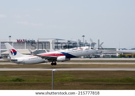 SEPANG, MALAYSIA - AUGT 4: Boeing 737-8H6(WL) registered with number 9M-MLM owned by Malaysia Airlines (MAS) take off at Kuala Lumpur International Air Port, Sepang, Malaysia on August 4, 2014