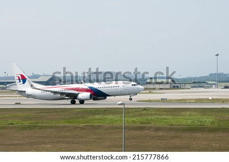 SEPANG, MALAYSIA - AUGT 4: Boeing 737-8H6(WL) registered with number 9M-MSC owned by Malaysia Airlines (MAS) take off from Kuala Lumpur International Air Port, Sepang, Malaysia on August 4, 2014.