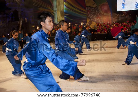 KUALA LUMPUR, MALAYSIA-MAY 21: Wushu athlete, a traditional Chinese martial arts perform the dance during the celebration of Color of 1 Malaysia on May 21, 2011 in Kuala Lumpur, Malaysia.
